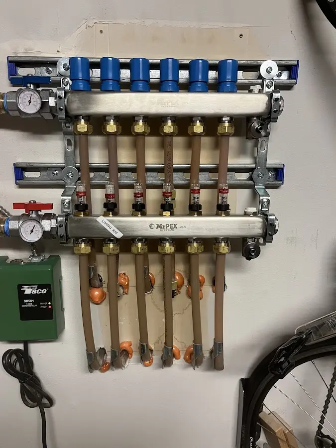 Plumber performing Leak Detection at a residential property in Burke Centre